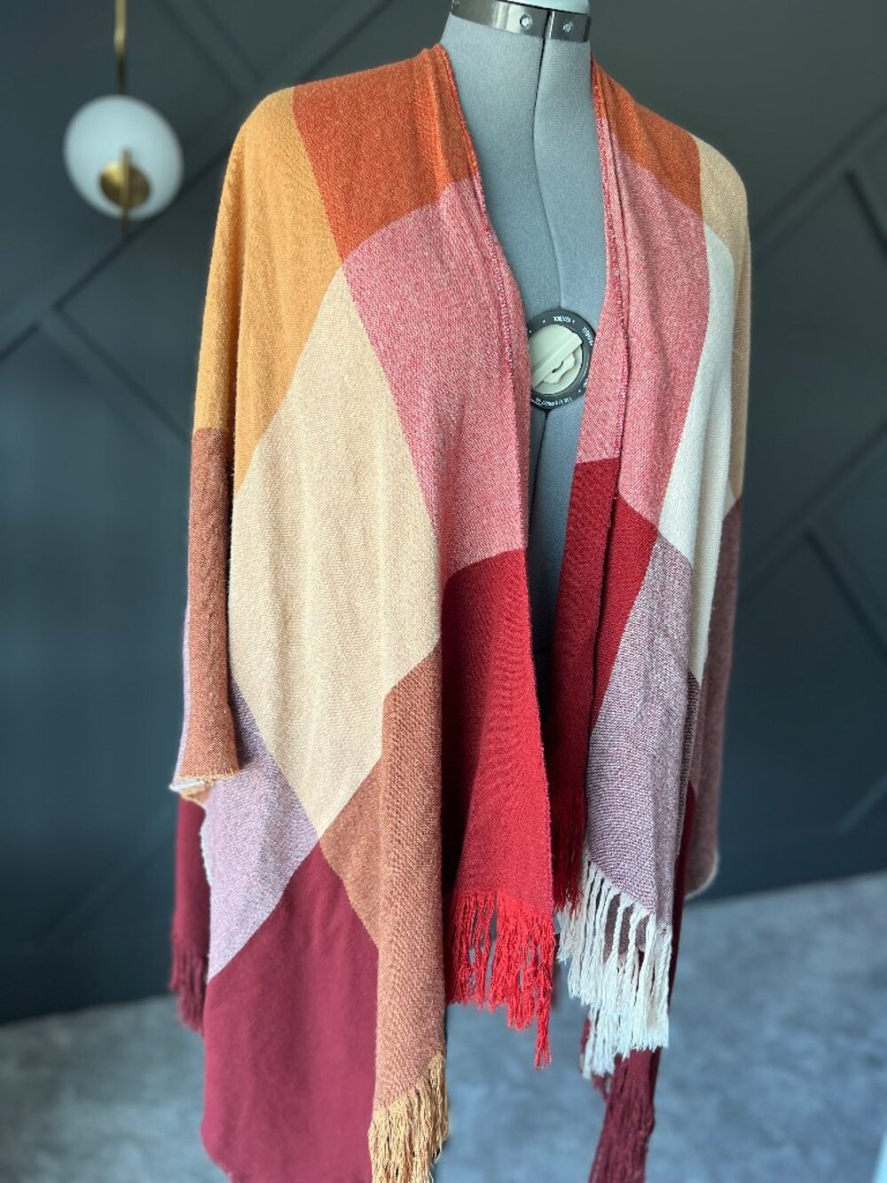 Soft and cozy colour-block open poncho